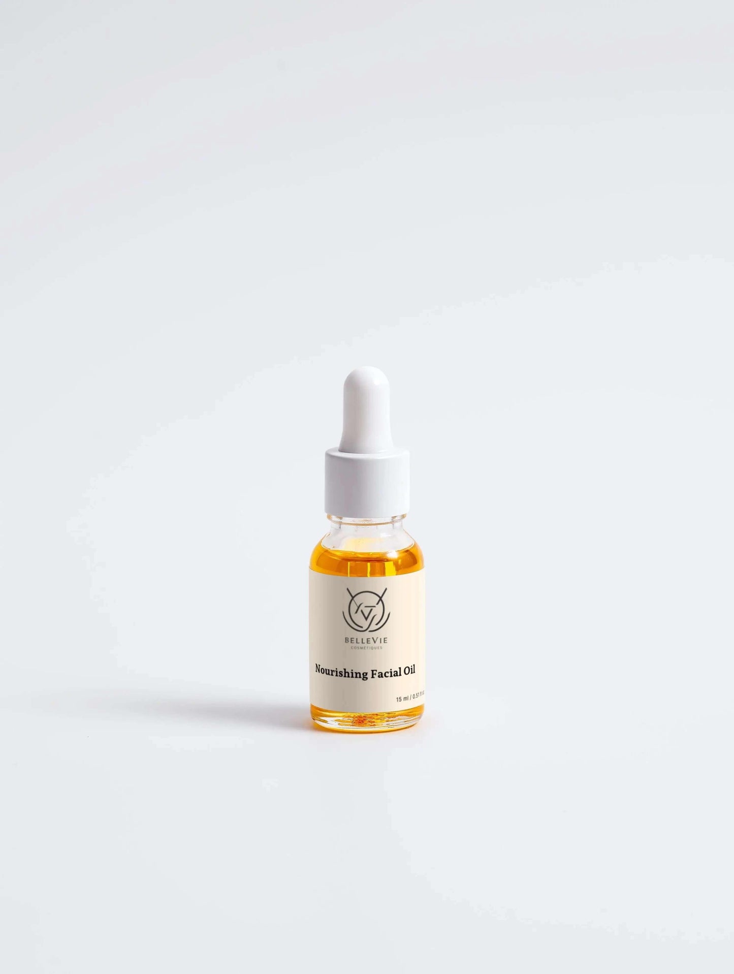 alt="Using dropper with Bellevie Cosmetic Nourishing Facial Oil 15ml, luxurious hydration with jojoba oil for bright, healthy skin, vegan, cruelty-free"