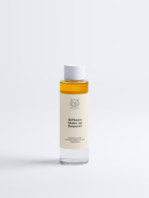 BelleVie BiPhasic Make-up Remover 100ml clear glass bottle close-up on light grey background showing two-phase formula, oil phase and water phase, gentle waterproof makeup remover