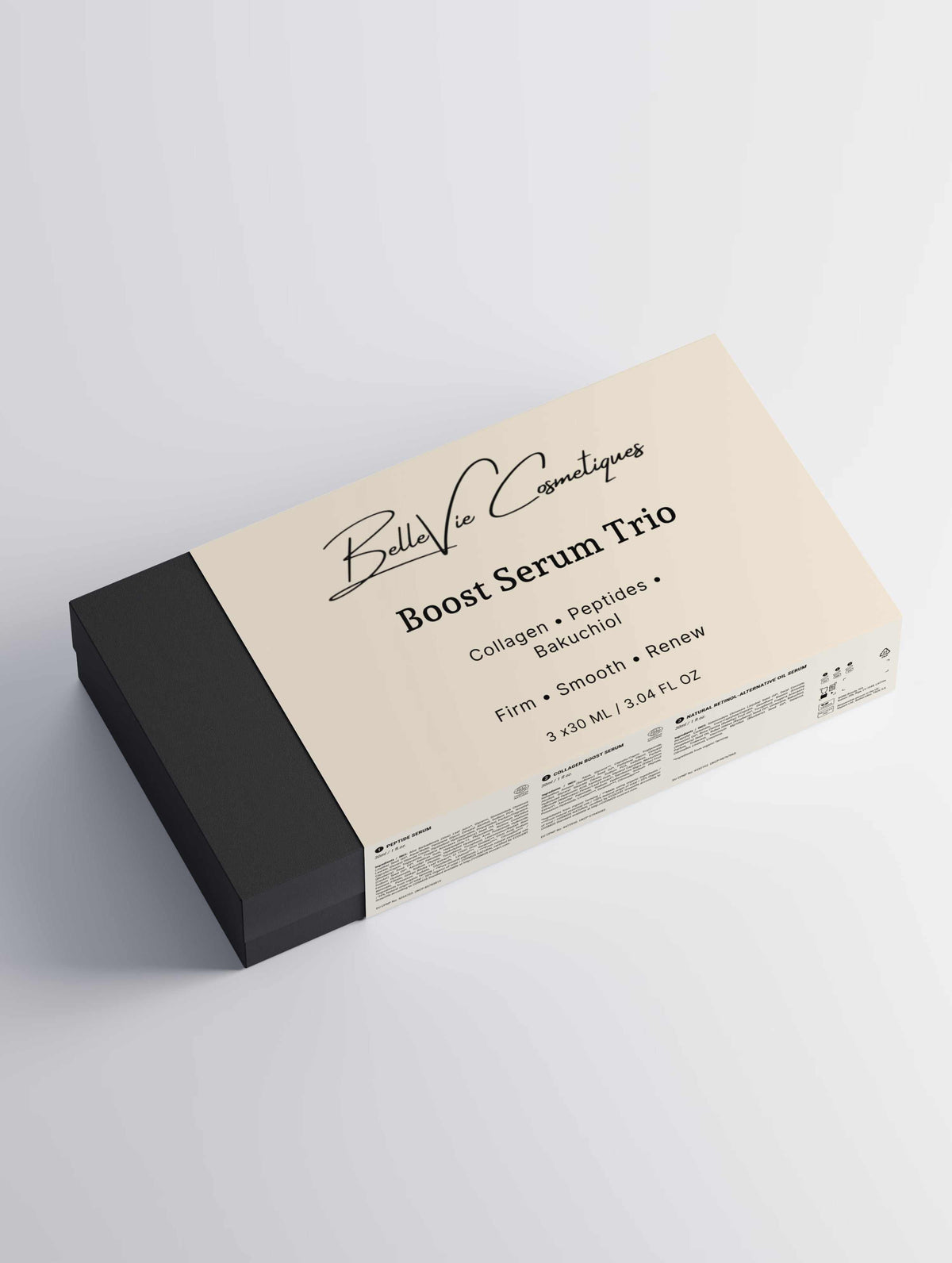Skincare serum gift set, Boost Serum Trio in a cream box with a black end panel and printed labeling.