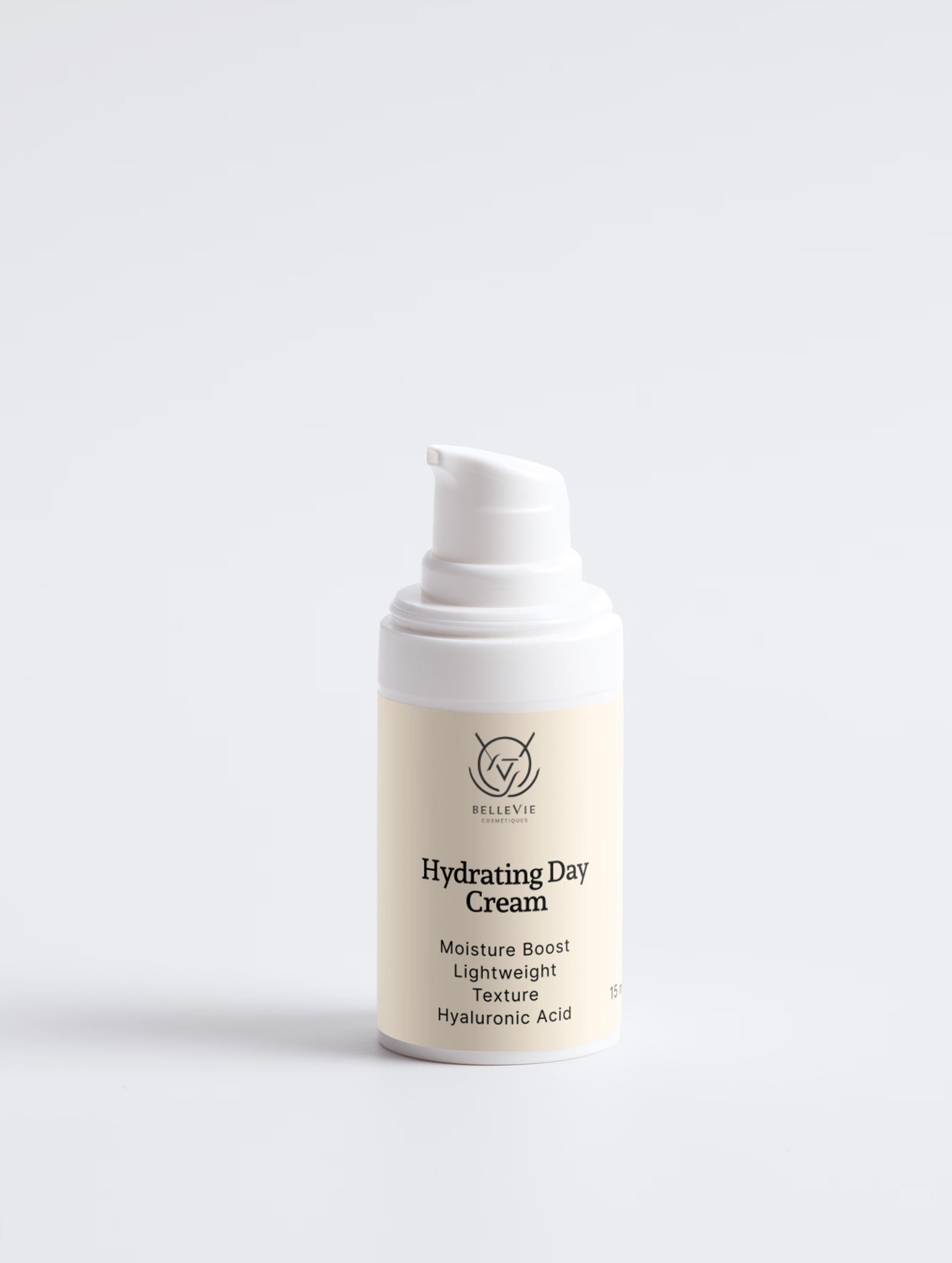 BelleVie Hydrating Day Cream 15ml pump bottle close-up on light grey background, moisture boost, lightweight texture, hyaluronic acid, best travel size day cream for dry and sensitive skin