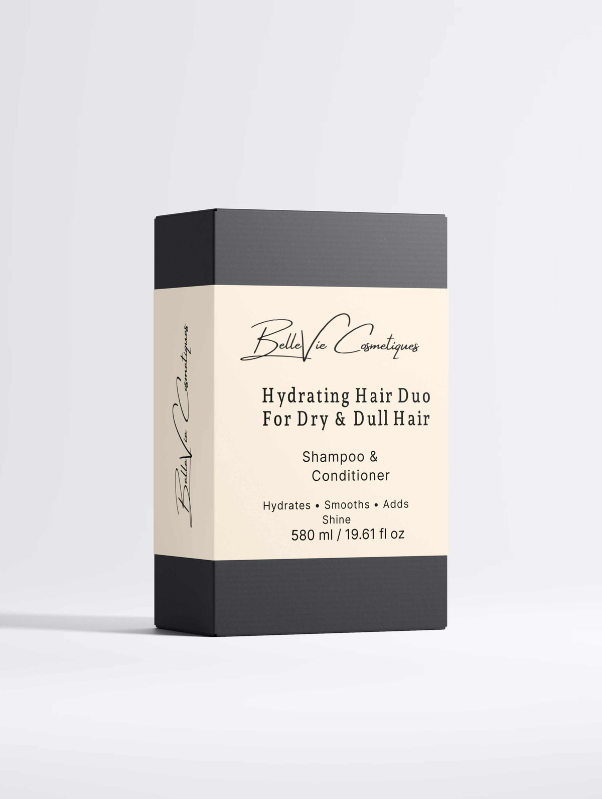 Hair care gift set box in cream and charcoal grey, with BelleVie branding, featuring the Shiny Hair Duo label and hair care details.