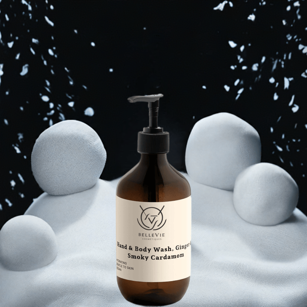 BelleVie Smoky Cardamom Hand & Body Wash 490ml amber pump bottle with snowflakes and snow balls on dark background – luxury natural body wash for men and women
