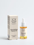 Bellevie Cosmetics Nourishing Facial Oil shown with its beige packaging box and a clear glass dropper bottle containing golden oil, set against a clean light gray background.