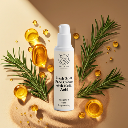 Bellevie Dark Spot Face Cream with Kojic Acid surrounded by rosemary leaves and oil droplets on a beige background