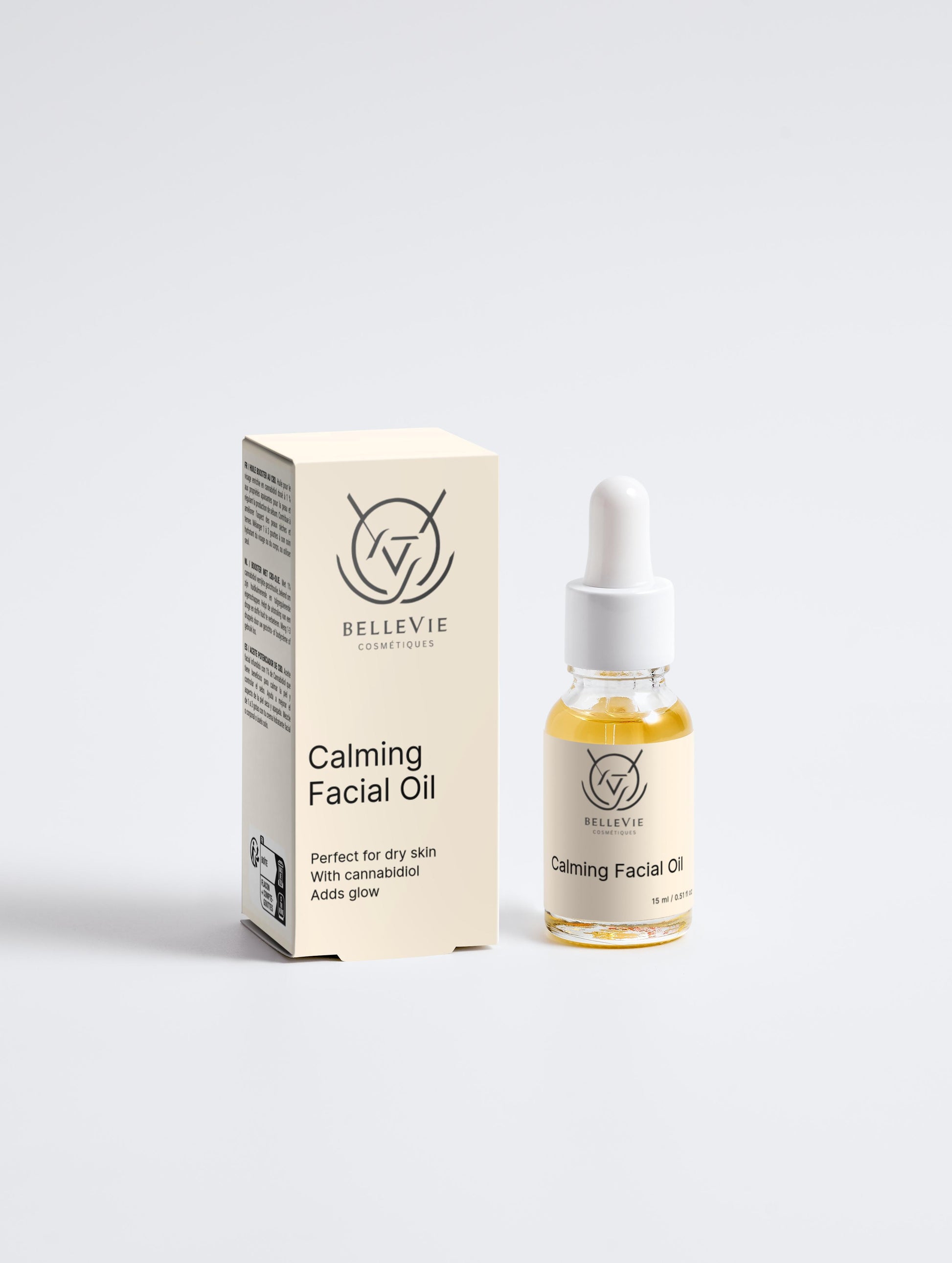 Bottle and box of Belle Vie Calming Facial Oil on a white background