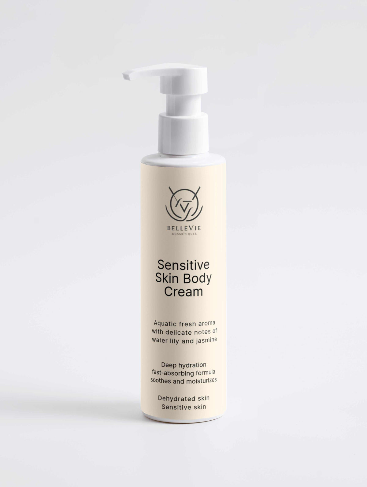 Sensitive Skin Body Cream in an ivory cylindrical pump bottle with a white dispenser and black label text.