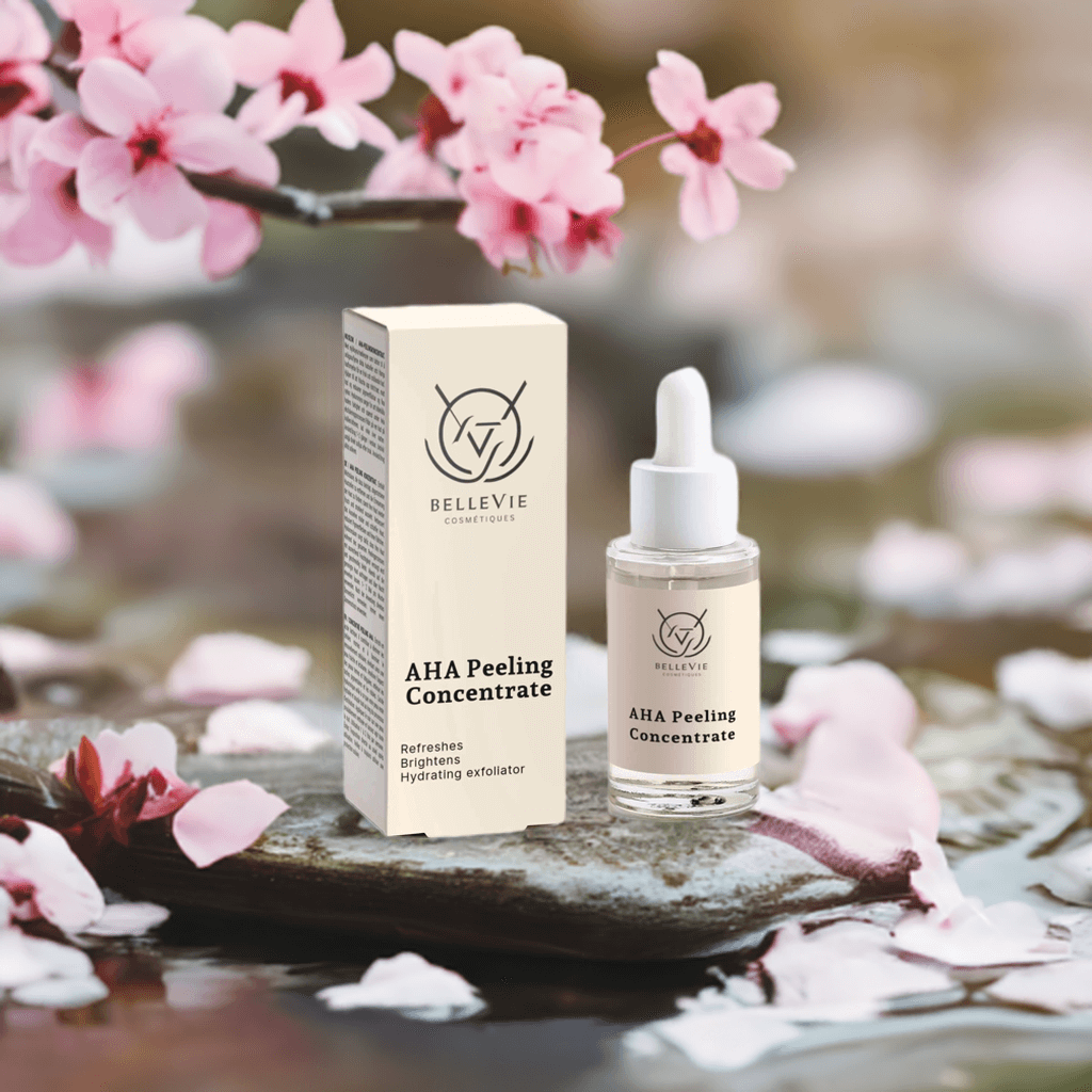 BELLEVIE AHA Peeling Concentrate bottle and box with cherry blossoms in the background