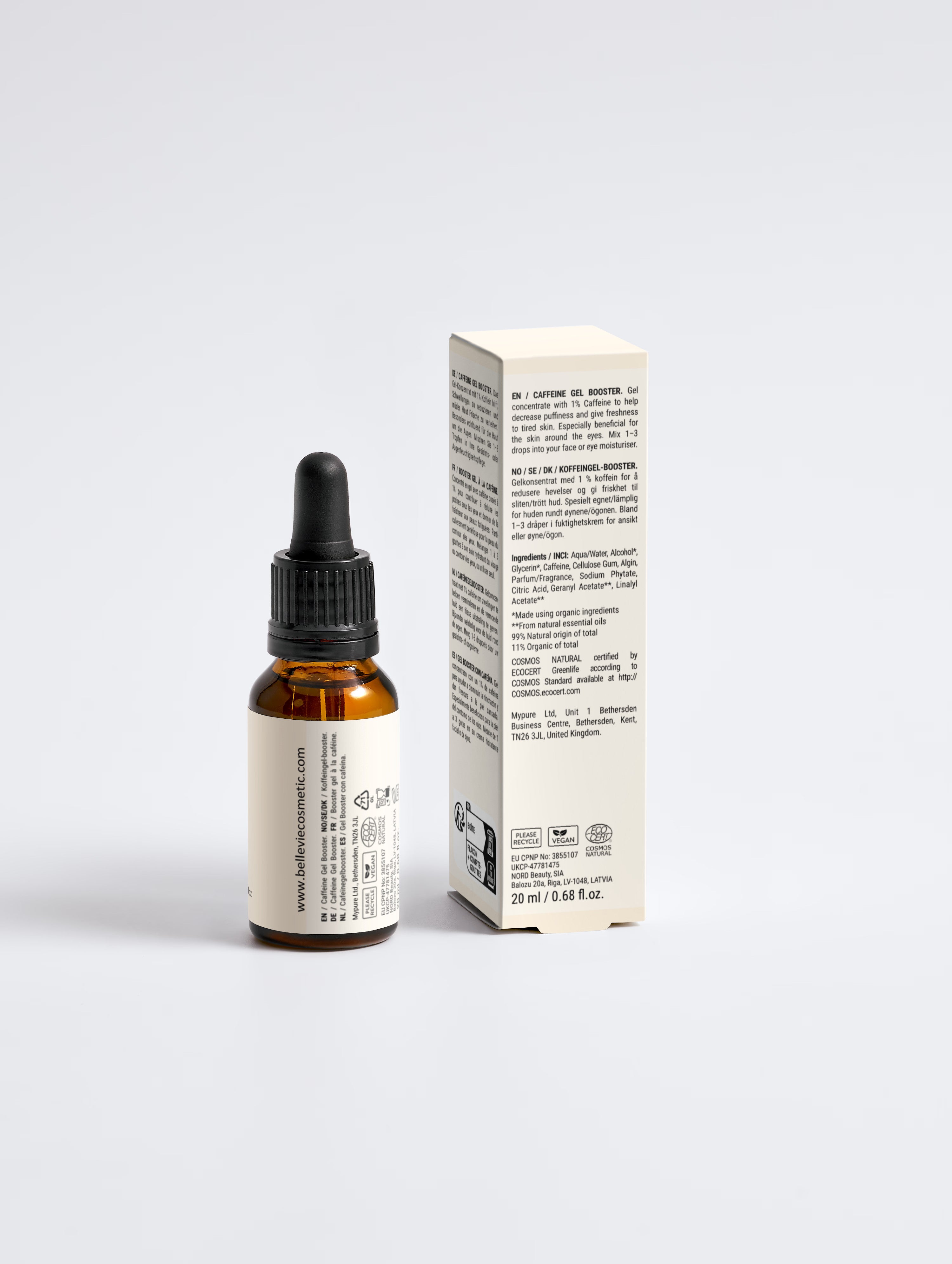 An amber glass dropper bottle with a black cap stands next to its cream-colored product box on a light gray background. The box has black text detailing ingredients and usage.