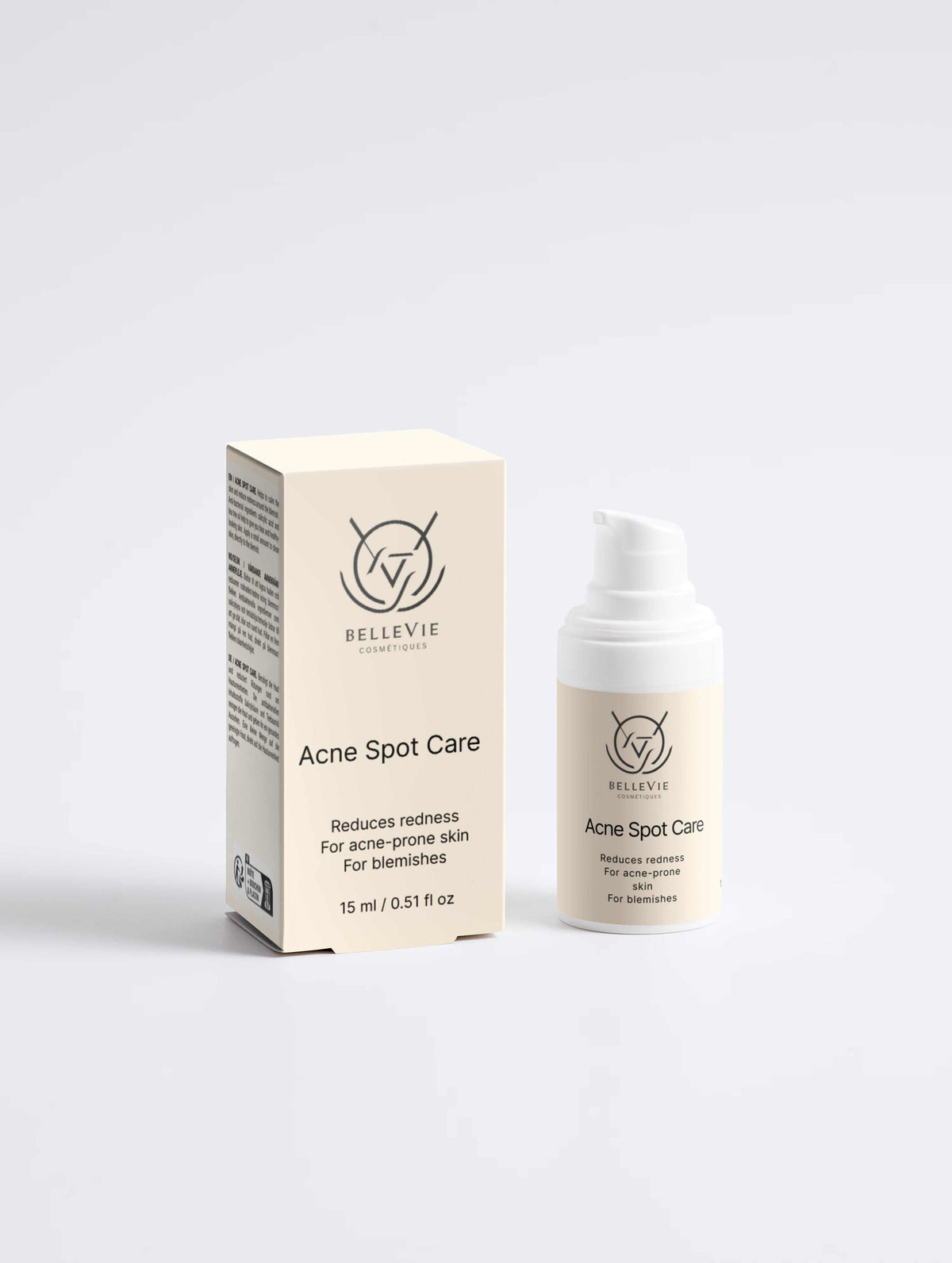 Acne Spot Care 15ml blemish treatment in a cream-colored carton and white pump bottle with black text and logo.