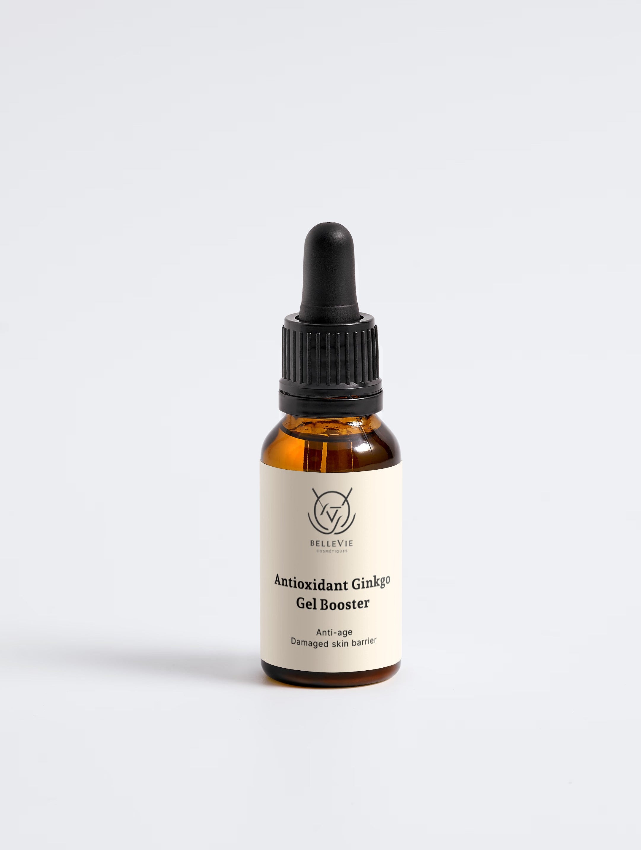 Bottle of essential oil with a dropper on a white background