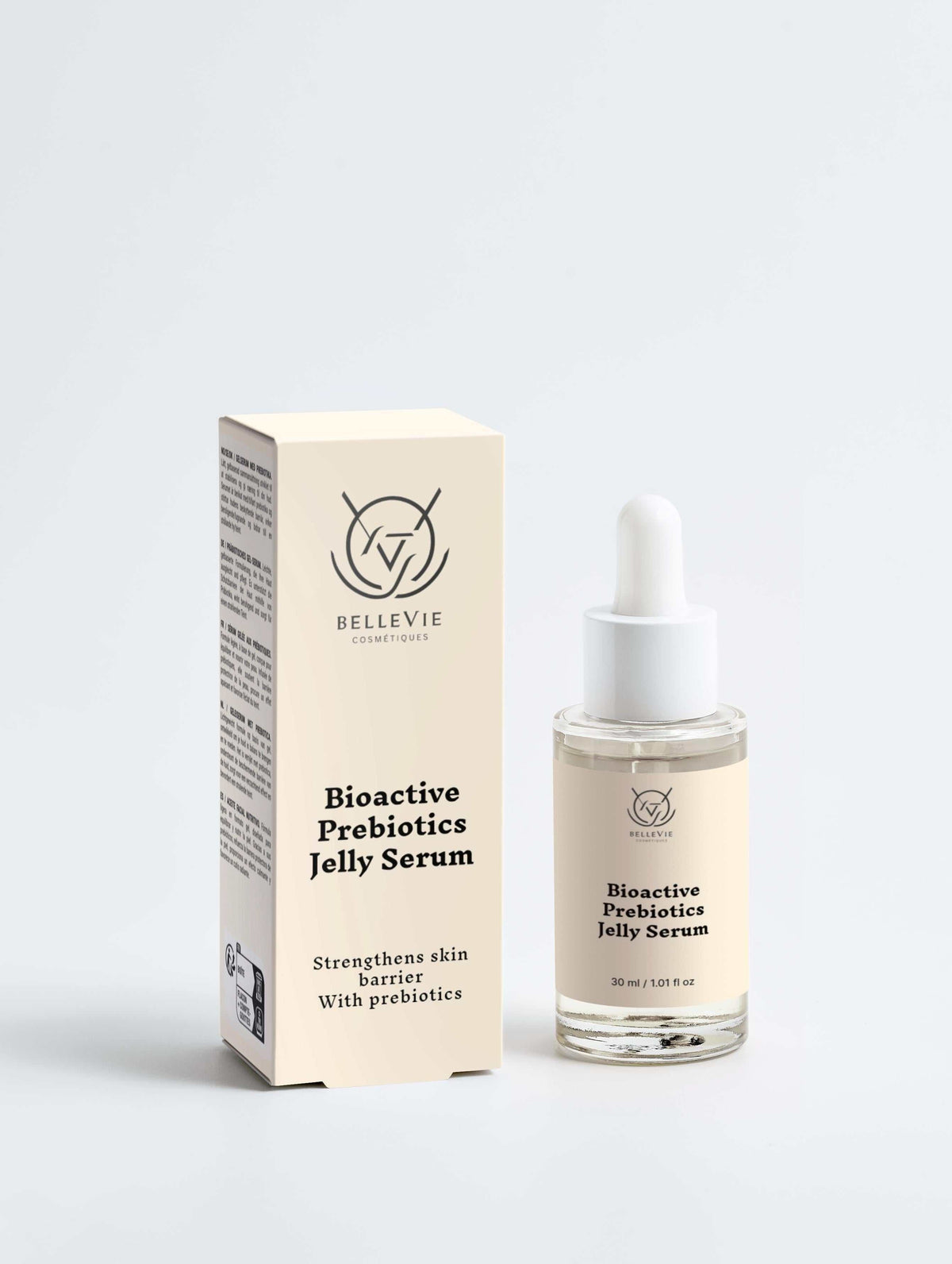 Bioactive Prebiotics Jelly Serum in a clear glass dropper bottle with white cap beside a cream printed box