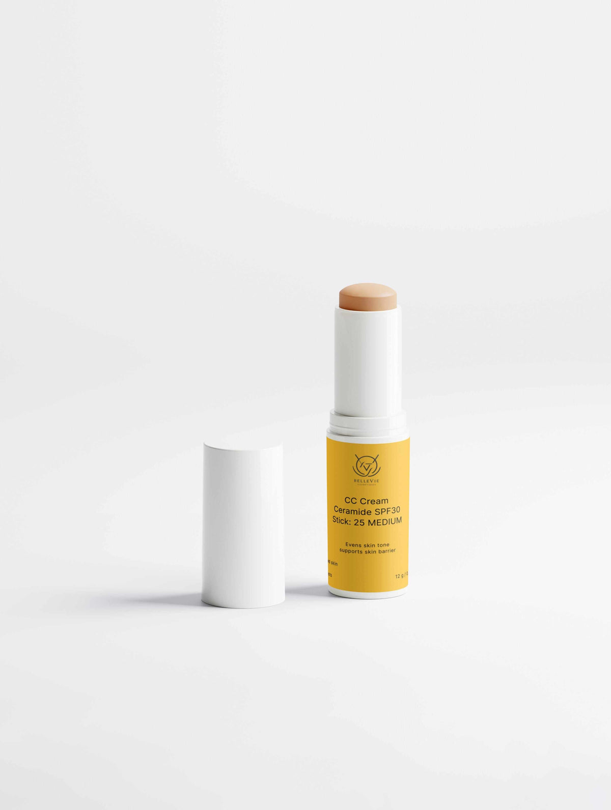 CC Cream Ceramide Stick in a yellow cylindrical tube with an exposed beige cream tip and a white cap