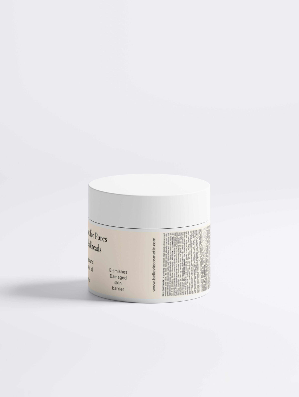 Clay Mask for Pores in a white cylindrical jar with a white lid and beige printed label detailing the mask.