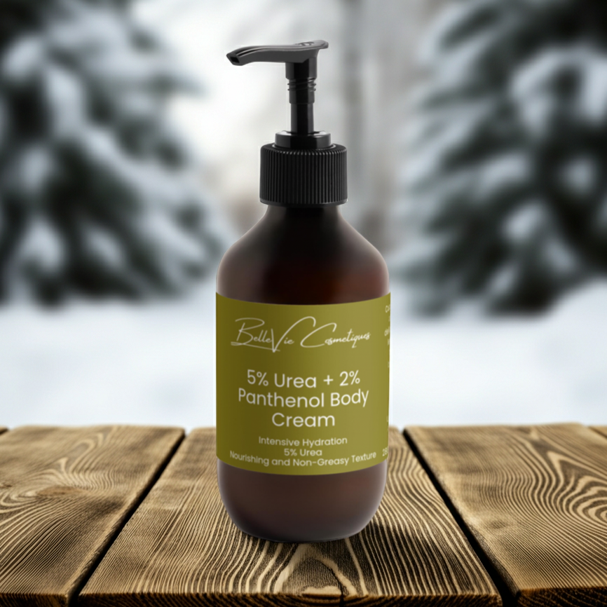 Bottle of Bella Vie Cosmetics 5% Urea + 2% Panthenol Body Cream 280ml on a wooden surface with blurred natural background