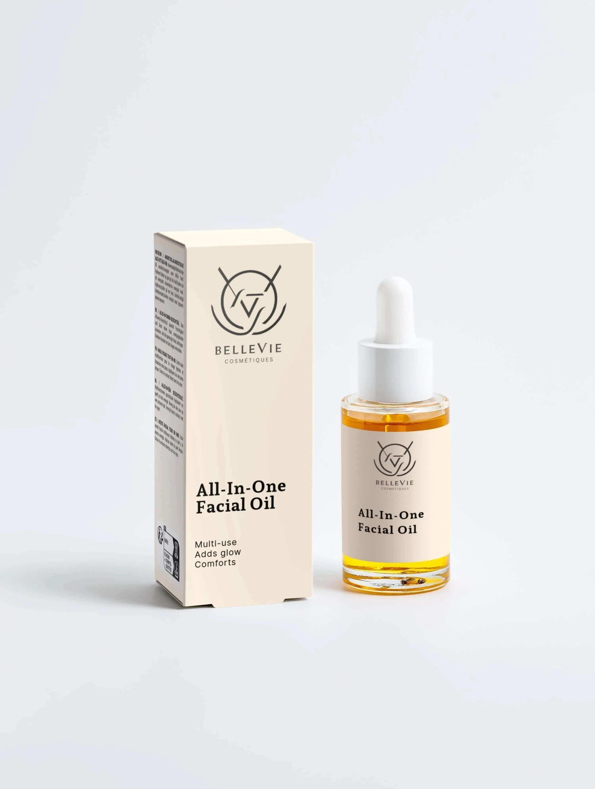Daily Radiance Collection Box with cream facial oil carton and clear dropper bottle of golden oil
