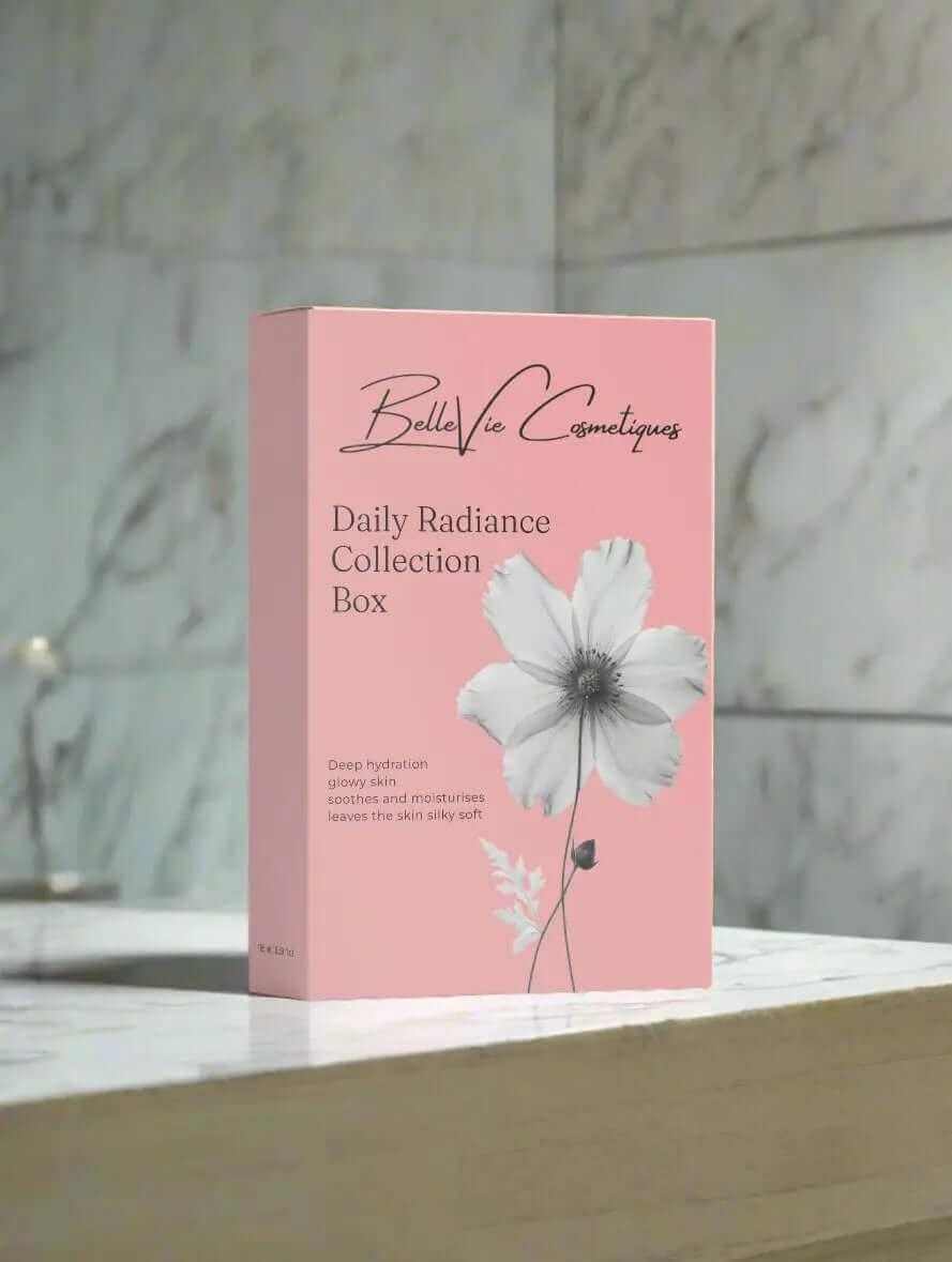 Daily Radiance Collection Box in a pink carton with elegant script, a white flower illustration and skincare text