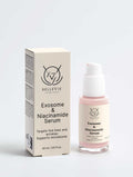 Exosome & Niacinamide Face Serum in a clear glass pump bottle with pale pink serum and a beige branded carton