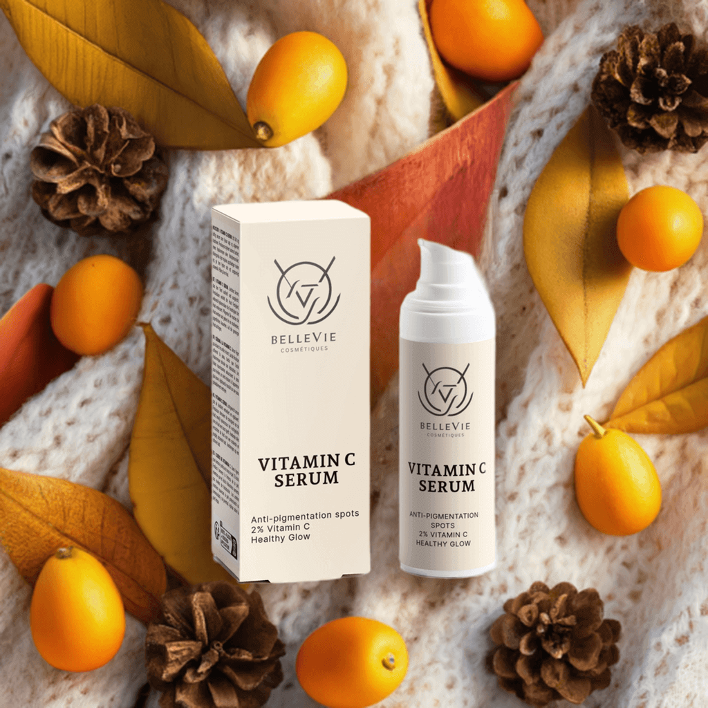 Bellevie Vitamin C Serum packaging with decorative elements on a textured surface.