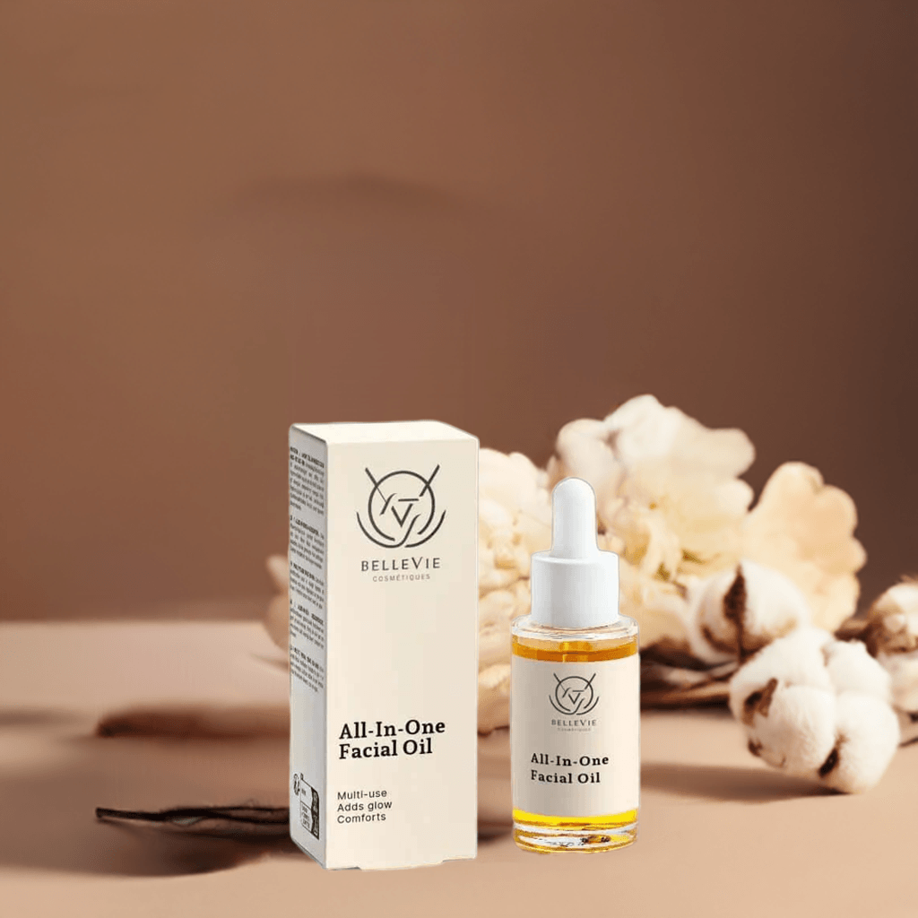 Bellevie All-in-One Facial Oil bottle and packaging on a beige background with decorative elements.