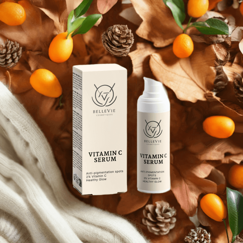 Vitamin C serum packaging with decorative elements on a warm background