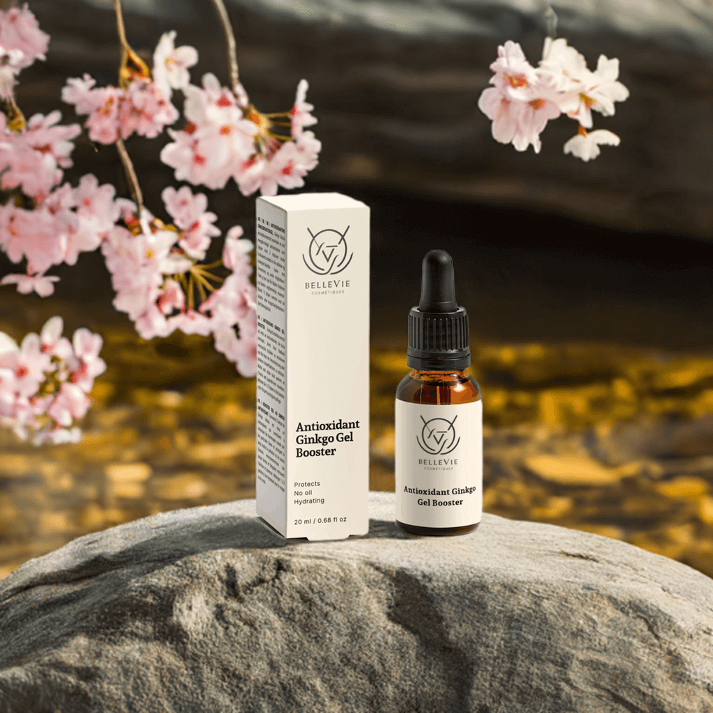 Bellevie Antioxidant Ginkgo Gel Booster 20ml bottle and packaging on a rock with cherry blossoms in the background