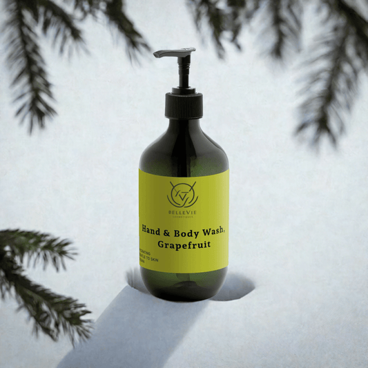 Bottle of Grapefruit Body Wash with natural eco-friendly packaging on bathroom counter