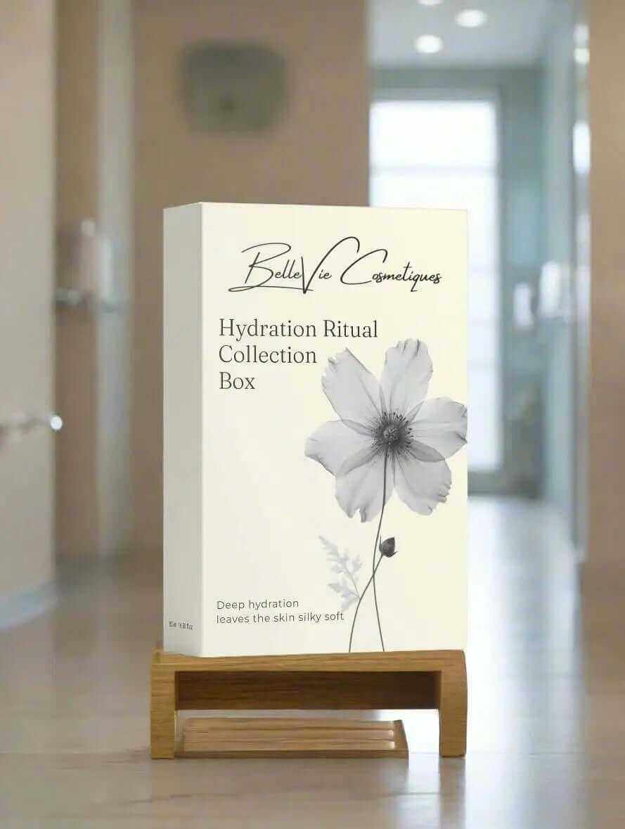 Hydration Ritual Collection skincare box in cream white, with elegant black lettering and a large grey flower illustration