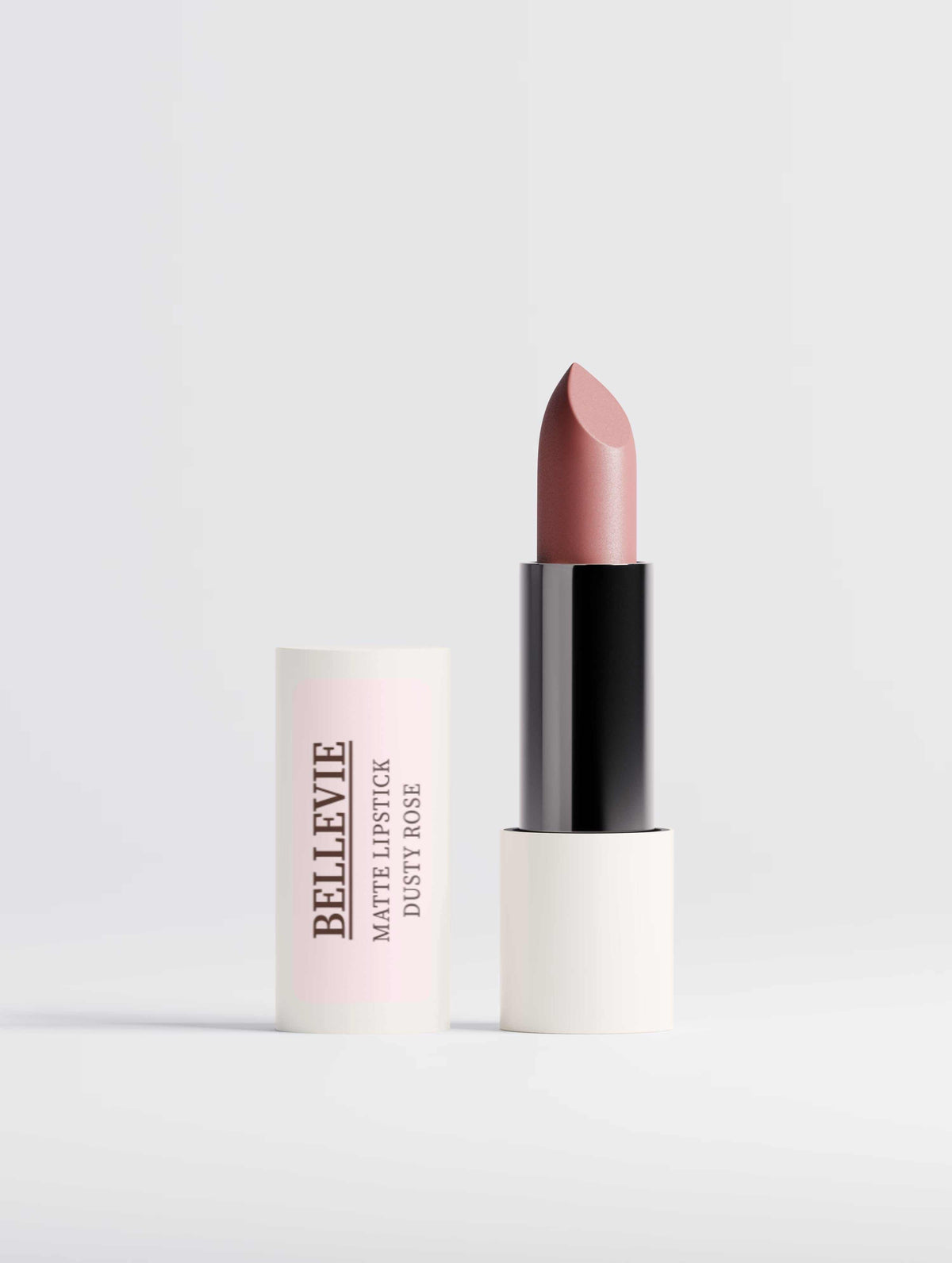 Nourishing Matte Lipstick in dusty rose pink with a smooth bullet and black-and-white cylindrical tube