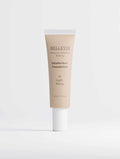 Peptide Skin-Perfecting Foundation in a beige tube, shade 10 Light Warm, with a white cap and skincare-powered label