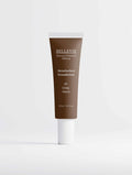 Peptide Skin-Perfecting Foundation in a brown tube with white cap, labelled SkinPerfect Foundation, shade 45 Deep Warm