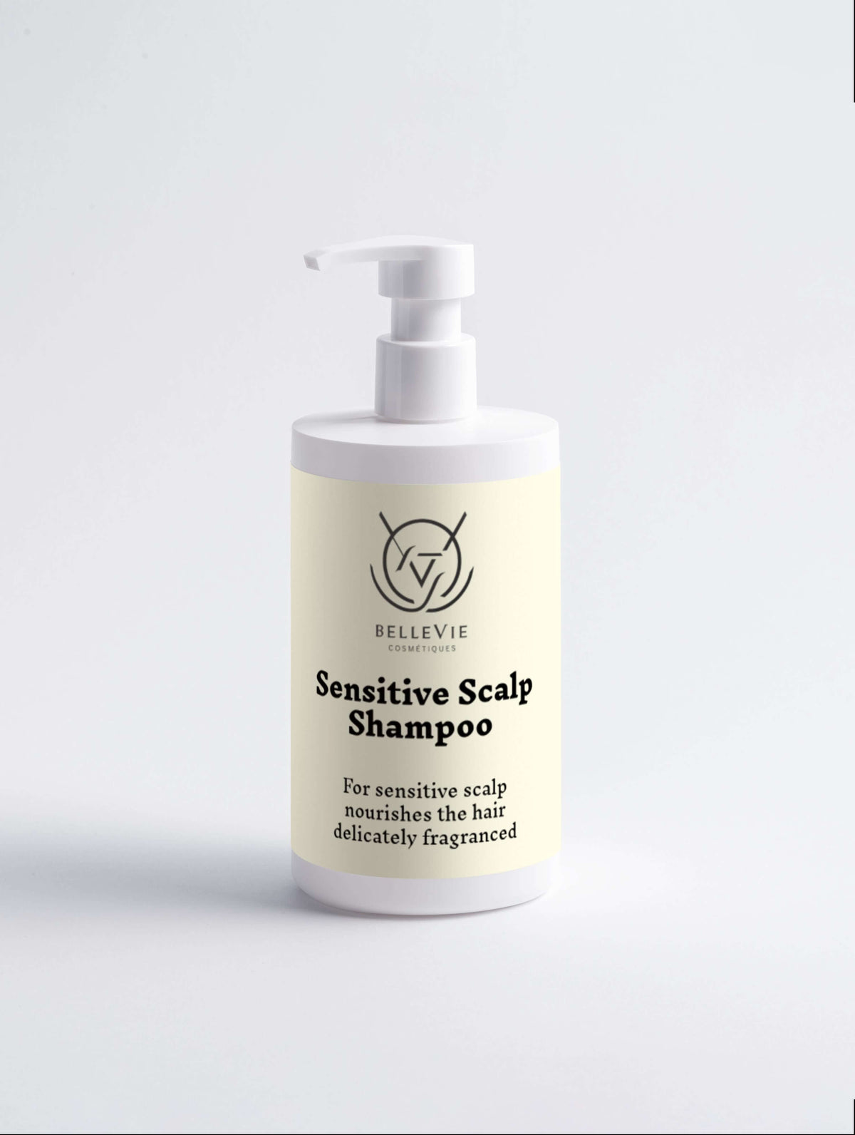 Sensitive Scalp Shampoo 400ml in an ivory bottle with a white pump, black BelleVie label and minimalist scalp illustration