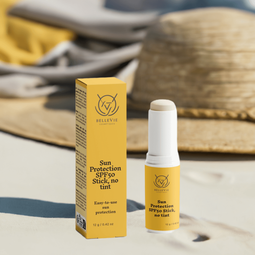 SPF50 Mineral Sunscreen Stick in yellow packaging with a white twist-up tube and matching box, labeled no tint